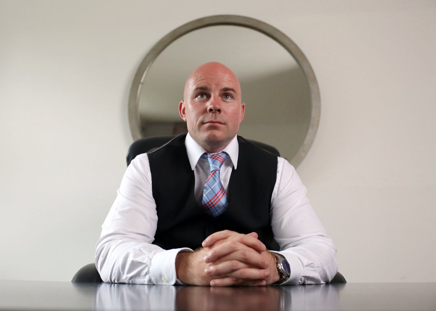 Adam Cox, clinical hypnotherapist, at his Harley Street office in London